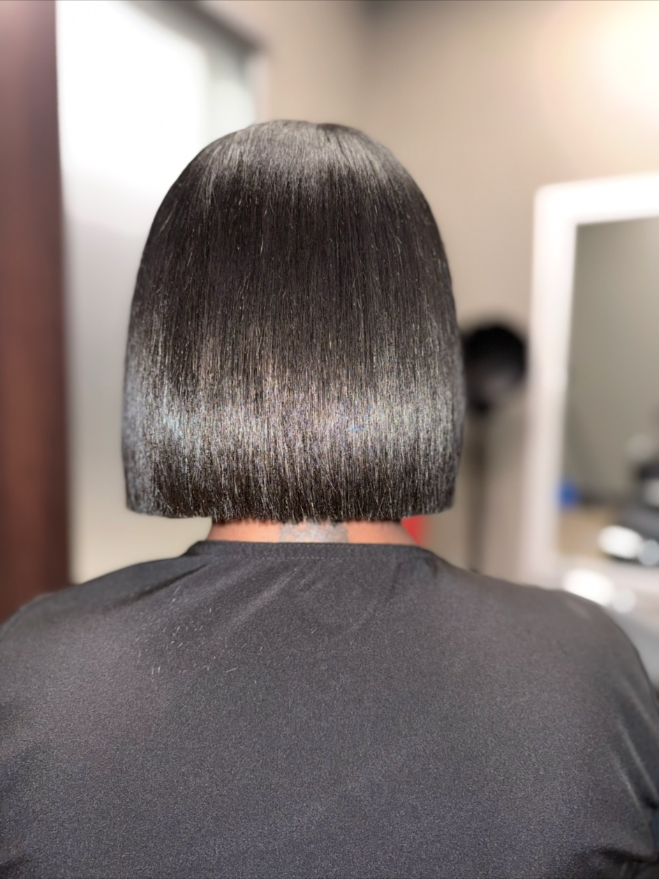 Precision blunt bob haircut with sleek shine