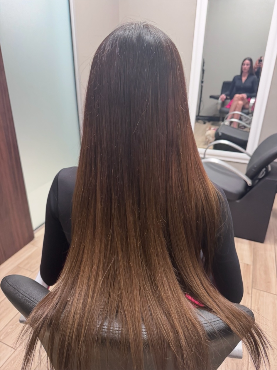 Four row weft extensions result with soft waves and natural blend